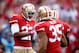 SAN FRANCISCO, CA - OCTOBER 06: Carlos Rogers #22 and Eric Reid #35 celebrate a touchdown scored by Tramaine Brock #26 of the San Francisco 49ers off of an interception by Matt Schaub #8 of the Houston Texans in the first quarter during their game at