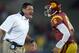Oct 10, 2013; Los Angeles, CA, USA; Southern California Trojans interim coach Ed Orgeron and quarterback Cody Kessler (6) celebrate after a touchdown in the first quarter against the Arizona Wildcats at Los Angeles Memorial Coliseum. Mandatory Credit: Kir
