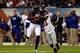 CHICAGO, IL - OCTOBER 10: Wide receiver Brandon Marshall #15 of the Chicago Bears is tackled by cornerback Prince Amukamara #20 of the New York Giants after a catch during a game at Soldier Field on October 10, 2013 in Chicago, Illinois. (Photo by Jonat