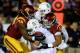 LOS ANGELES, CA - OCTOBER 10: Defensive ends Leonard Williams #94 and J.R. Tavai #58 of the USC Trojans tackle quarterback B.J. Denker #7 of the Arizona Wildcats at Los Angeles Coliseum on October 10, 2013 in Los Angeles, California. (Photo by Stephen Du