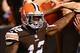 Oct 3, 2013; Cleveland, OH, USA; Cleveland Browns wide receiver Josh Gordon (12) celebrates with fans after catching a pass for a touchdown during the third quarter against the Buffalo Bills at FirstEnergy Stadium. Mandatory Credit: Andrew Weber-USA TODAY