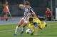 VERONA, ITALY - SEPTEMBER 25: Bostjan Cesar (R) of AC Chievo Verona competes with Fernando Llorente of Juventus during the Serie A match between AC Chievo Verona and Juventus at Stadio Marc'Antonio Bentegodi on September 25, 2013 in Verona, Italy. (Phot