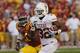 AMES, IA - OCTOBER 3: Running back Johnathan Gray #32 of the Texas Longhorns drives the ball to the end zone for a touchdown as defensive back Deon Broomfield #26 of the Iowa State Cyclones pursues in the first half of play at Jack Trice Stadium on Octo