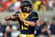 BERKELEY, CA - SEPTEMBER 14: Jared Goff #16 of the California Golden Bears drops back to pass during the first quarter against the Ohio State Buckeyes at California Memorial Stadium on September 14, 2013 in Berkeley, California. (Photo by Thearon W. Hen
