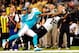 NEW ORLEANS, LA - SEPTEMBER 30: Nolan Carroll #28 of the Miami Dolphins defends a pass intended for Marques Colston #12 of the New Orleans Saints during a game at the Mercedes-Benz Superdome on September 30, 2013 in New Orleans, Louisiana. The Saints de