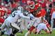 KANSAS CITY, MO - OCTOBER 28: Running back Jamaal Charles #25 of the Kansas City Chiefs rushes around linebacker Rolando McClain #55 of the Oakland Raiders during the third quarter on October 28, 2012 at Arrowhead Stadium in Kansas City, Missouri. Oakla