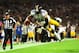 LONDON, ENGLAND - SEPTEMBER 29: Running back Le'Veon Bell #26 of the Pittsburgh Steelers dives into the endzone turnover score a touchdown during the NFL International Series game between Pittsburgh Steelers and Minnesota Vikings at Wembley Stadium on Se