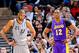 SAN ANTONIO, TX - APRIL 24: Dwight Howard #12 of the Los Angeles Lakers and Tim Duncan #21 of the San Antonio Spurs wait to resume action in Game Two of the Western Conference Quarterfinals during the 2013 NBA Playoffs on April 24, 2013 at the AT&T Center