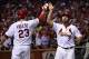 Holliday (right) and David Freese (left) could be the difference makers against Greinke.