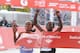 CHICAGO, IL - OCTOBER 07: Atsede Baysa of Ethiopia (R) and Rita Jeptoo of Kenya finish first and second in the womens 2012 Bank of America Chicago Marathon on October 7, 2012 in Chicago, Illinois. Baysa won the race. (Photo by David Banks/Getty Images)