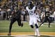 Oct 5, 2013; Waco, TX, USA; Baylor Bears cornerback Joe Williams (22) breaks up a pass intended for West Virginia Mountaineers wide receiver Ronald Carswell (12) during the second half at Floyd Casey Stadium. The Bears defeated the Mountaineers 73-42. Man
