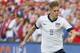 KANSAS CITY, KS - OCTOBER 11: Aron Johannsson #9 of the U.S. Men's National Soccer Team defends against Ryan Johnson #9 of Jamaica in the first half at Sporting Park on October 11, 2013 in Kansas City, Kansas. (Photo by Kyle Rivas/Getty Images)