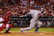 ST LOUIS, MO - OCTOBER 11: Juan Uribe #5 of the Los Angeles Dodgers hits a two RBI single in the third inning against the St. Louis Cardinals during Game One of the National League Championship Series at Busch Stadium on October 11, 2013 in St Louis, Mis
