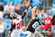 CHARLOTTE, NC - DECEMBER 09: Greg Olsen #88 of the Carolina Panthers makes a touchdown catch against Thomas DeCoud #28 of the Atlanta Falcons during play at Bank of America Stadium on December 9, 2012 in Charlotte, North Carolina. (Photo by Grant Halverso