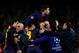 BARCELONA, SPAIN - APRIL 10: Gerard Pique of Barcelona jumps on his team mates as they celebrate Pedro of Barcelona scoring the equalising goal during the UEFA Champions League quarter-final second leg match between Barcelona and Paris St Germain at Nou