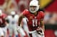 GLENDALE, AZ - SEPTEMBER 15: Wide receiver Larry Fitzgerald #11 of the Arizona Cardinals runs with the football after a reception against the Detroit Lions during the NFL game at the University of Phoenix Stadium on September 15, 2013 in Glendale, Arizon