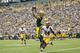 GREEN BAY, WI - SEPTEMBER 15: Jordy Nelson #87 of the Green Bay Packers catches a touchdown pass over Bacarri Rambo #24 of the Washington Redskins at Lambeau Field on September 15, 2013 in Green Bay, Wisconsin. The Packers defeated the Redskins 38-20. (Ph