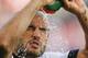 KANSAS CITY, KS - OCTOBER 11: Landon Donovan #10 of the U.S. Men's National Soccer Team sprays himself with water before taking the field against Jamaica at Sporting Park on October 11, 2013 in Kansas City, Kansas. (Photo by Kyle Rivas/Getty Images)