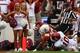 DALLAS, TX - OCTOBER 12: Chris Whaley #96 of the Texas Longhorns carries the ball into the end zone turnover score against Blake Bell #10 of the Oklahoma Sooners after Whaley intercepted the ball in the first quarter at the Cotton Bowl on October 12, 201