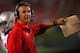 EVANSTON, IL - OCTOBER 05: Head coach Urban Meyer of the Ohio State Buckeyes gives instructions on the sidelines during a game against the Northwestern Wildcats at Ryan Field on October 5, 2013 in Evanston, Illinois. Ohio State defeated Northwestern 40-30