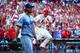 ST LOUIS, MO - OCTOBER 12: David Freese #23 of the St. Louis Cardinals celebrates at home plate after scoring the first run of the game on a sacrafice fly hit by Jon Jay #19 as Clayton Kershaw #22 of the Los Angeles Dodgers reacts in the fifth inning of