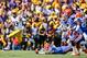 Oct 12, 2013; Baton Rouge, LA, USA; LSU Tigers running back Jeremy Hill (33) runs against the Florida Gators during the first quarter of a game at Tiger Stadium. Mandatory Credit: Derick E. Hingle-USA TODAY Sports