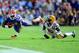 BATON ROUGE, LA - OCTOBER 12: Mack Brown #33 of the Florida Gators is tripped up by Kwon Alexander #25 of the LSU Tigers during a game at Tiger Stadium on October 12, 2013 in Baton Rouge, Louisiana. (Photo by Stacy Revere/Getty Images)