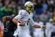 SEATTLE, WA - OCTOBER 12: Quarterback Marcus Mariota #8 of the Oregon Ducks rushes against the Washington Huskies on October 12, 2013 at Husky Stadium in Seattle, Washington. (Photo by Otto Greule Jr/Getty Images)