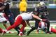 SEATTLE, WA - SEPTEMBER 28: Bishop Sankey #25 of Washington Huskies is tackled by linebacker Jake Fischer #33 of the Arizona Wildcats during the second quarter on September 28, 2013 at Husky Stadium in Seattle, Washington. (Photo by Kevin Casey/Getty Im