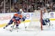 EDMONTON, CANADA - APRIL 27: Taylor Hall #4 of the Edmonton Oilers battles for the puck as Maxim Lapierre #40 of the Vancouver Canucks defends goalie Roberto Luongo #1 on April 27, 2013 at Rexall Place in Edmonton, Alberta, Canada. (Photo by John Ulan/NH