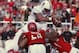 SALT LAKE CITY, UT - OCTOBER 12: Tyler Gaffney #25 of the Stanford Cardinal jumps over LT Tuipulotu #58 and Davion Orphey #33 of the Utah Utes to score a touchdown during the first half of an NCAA football game October 12, 2013 at Rice Eccles Stadium in S