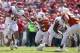 DALLAS, TX - OCTOBER 12: Blake Bell #10 of the Oklahoma Sooners carries the ball against Malcom Brown #90 of the Texas Longhorns at the Cotton Bowl on October 12, 2013 in Dallas, Texas. The Longhorns beat the Sooners 36-20. (Photo by Tom Pennington/Gett