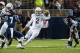 OXFORD, MS - OCTOBER 12: Quarterback Johnny Manziel #2 of the Texas A&M Aggies runs through traffic during their game against the Ole Miss Rebels on October 12, 2013 at Vaught-Hemingway Stadium in Oxford, Mississippi. (Photo by Michael Chang/Getty Imag
