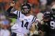 Oct 5, 2013; Auburn, AL, USA; Mississippi Rebels quarterback Bo Wallace (14) is tackled by Auburn Tigers defensive end Carl Lawson (55) and defensive lineman Angelo Blackson (98) at Jordan Hare Stadium. The Tigers defeated the Rebels 33-20. Mandatory Cre