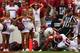 DALLAS, TX - OCTOBER 12: Chris Whaley #96 of the Texas Longhorns carries the ball into the end zone turnover score against Blake Bell #10 of the Oklahoma Sooners after Whaley intercepted the ball in the first quarter at the Cotton Bowl on October 12, 201