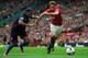 MANCHESTER, ENGLAND - SEPTEMBER 14: Adnan Januzaj of Manchester United takes on Jason Puncheon of Crystal Palace during the Barclays Premier League match between Manchester United and Crystal Palace at Old Trafford on September 14, 2013 in Manchester, En
