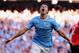 MANCHESTER, ENGLAND - SEPTEMBER 22: Samir Nasri of Manchester City celebrates as he scores their fourth goal during the Barclays Premier League match between Manchester City and Manchester United at the Etihad Stadium on September 22, 2013 in Manchester,