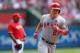 ARLINGTON, TX - SEPTEMBER 29: Mike Trout #27 of the Los Angeles Angels runs the bases after hitting a solo homerun against the Texas Rangers in the first inning at Rangers Ballpark in Arlington on September 29, 2013 in Arlington, Texas. (Photo by Ronald