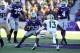 Oct 12, 2013; Manhattan, KS, USA; Kansas State Wildcats running back John Hubert (33) looks for room to run against Baylor Bears safety Terrell Burt (13) during the Wildcats' 35-25 loss at Bill Snyder Family Stadium. Mandatory Credit: Scott Sewell-USA TOD