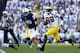 STATE COLLEGE, PA - OCTOBER 12: Devin Gardner #98 of the Michigan Wolverines rushes against the Penn State Nittany Lions during the game on October 12, 2013 at Beaver Stadium in State College, Pennsylvania. (Photo by Justin K. Aller/Getty Images)
