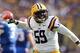 Oct 12, 2013; Baton Rouge, LA, USA; LSU Tigers defensive end Jermauria Rasco (59) celebrates making a play against the Florida Gators during the second quarter of their game at Tiger Stadium. Mandatory Credit: Chuck Cook-USA TODAY Sports