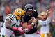 BALTIMORE, MD - OCTOBER 13: Dallas Clark #87 of the Baltimore Ravens is tackled by Morgan Burnett #42 of the Green Bay Packers in the second quarter during a game at M&T Bank Stadium on October 13, 2013 in Baltimore, Maryland. (Photo by Patrick McDermot