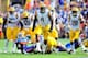 BATON ROUGE, LA - OCTOBER 12: Ego Ferguson #9 of the LSU Tigers reacts to a defensive stop against the Florida Gators during a game at Tiger Stadium on October 12, 2013 in Baton Rouge, Louisiana. LSU won the game 17-6. (Photo by Stacy Revere/Getty Image