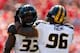 ATHENS, GA - OCTOBER 12: Markus Golden #33 of the Missouri Tigers reacts after a sack against the Georgia Bulldogs with Lucas Vincent #96 at Sanford Stadium on October 12, 2013 in Athens, Georgia. (Photo by Kevin C. Cox/Getty Images)