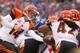 ORCHARD PARK, NY - OCTOBER 13: Andy Dalton #14 hands off to BenJarvus Green-Ellis #42 of the Cincinnati Bengals against the Buffalo Bills at Ralph Wilson Stadium on October 13, 2013 in Orchard Park, New York. (Photo by Rick Stewart/Getty Images)