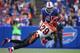 ORCHARD PARK, NY - OCTOBER 13: Tashard Choice #20 of the Buffalo Bills is tackled as he carries the ball during NFL game action by Leon Hall #29 of the Cincinnati Bengals at Ralph Wilson Stadium on October 13, 2013 in Orchard Park, New York. (Photo by Tom