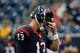 HOUSTON, TX - OCTOBER 13: T.J. Yates #13 of the Houston Texans reacts after a play in the second half against the St. Louis Rams at Reliant Stadium on October 13, 2013 in Houston, Texas. (Photo by Scott Halleran/Getty Images)
