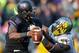DE DeForest Buckner harasses QB Keith Price