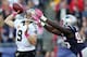 FOXBORO, MA - OCTOBER 13: Quarterback Drew Brees #9 of the New Orleans Saints gets off a pass while being hit by defensive end Chandler Jones #95 of the New England Patriots during the first half at Gillette Stadium on October 13, 2013 in Foxboro, Massac