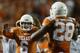 AUSTIN, TX - SEPTEMBER 21: Case McCoy #6 of the Texas Longhorns celebrates a touchdown with Malcolm Brown #28 of the Texas Longhorns against the Kansas State Wildcats at Darrell K Royal-Texas Memorial Stadium on September 21, 2013 in Austin, Texas. (Pho